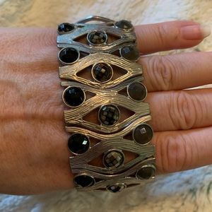 stretchy bracelet  black rhinestones 2 shades front silver tone under. Fashion